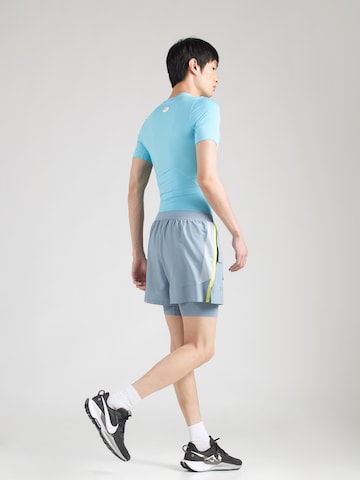 UNDER ARMOUR - regular Pantalón deportivo 'LAUNCH' en azul
