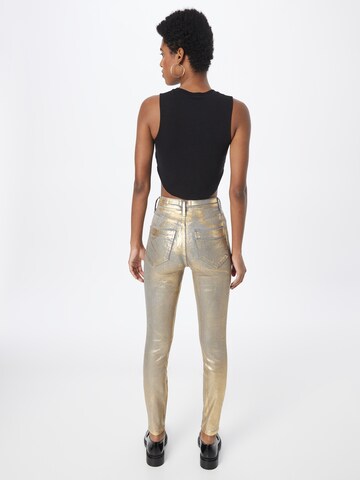 River Island Slimfit Jeansy w kolorze złoty