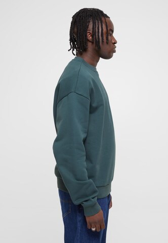 Urban Classics Свитшот в Зеленый