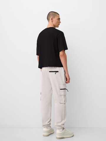 Bershka Tapered Cargo trousers in Grey