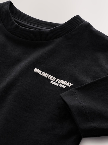 Next T-shirt i svart