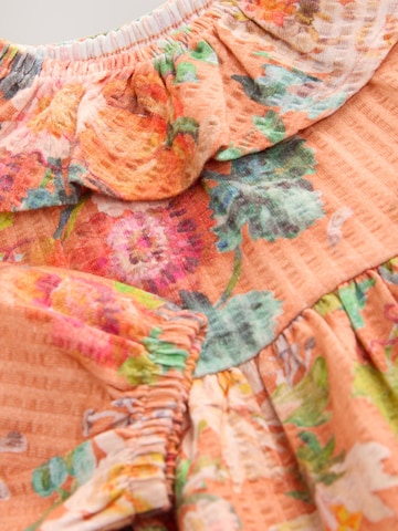 Robe Next en orange