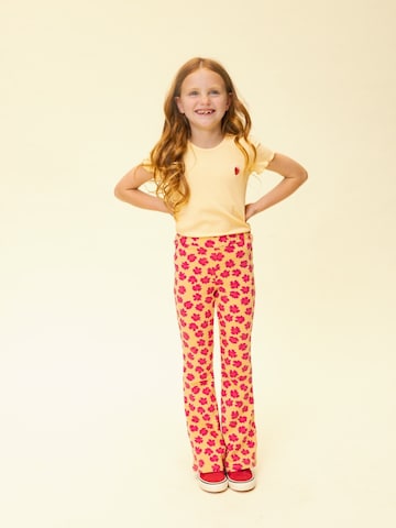 Looxs Revolution Flared Trousers in Orange: front