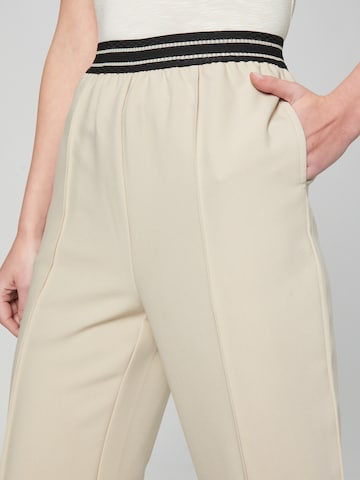 Guido Maria Kretschmer Women Regular Pleated Pants 'Eleni' in Beige