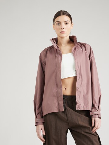 Veste de sport 'Fast' NIKE en rose : devant