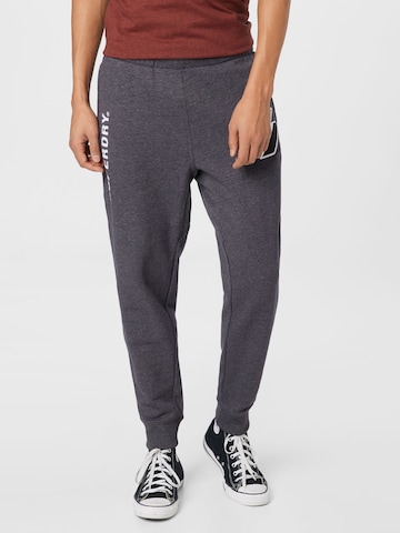 Regular Pantalon de sport Superdry en gris : devant