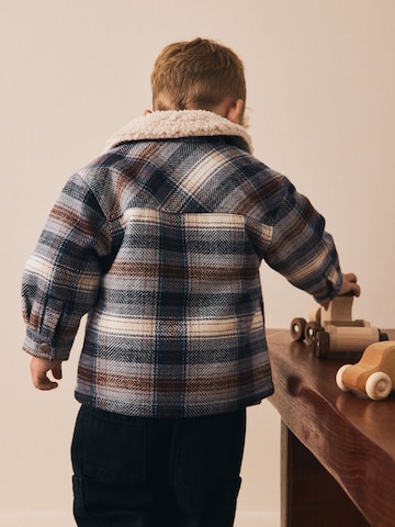 Next Tussenjas in Blauw