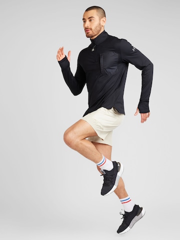 UNDER ARMOUR Funktionstopp i svart