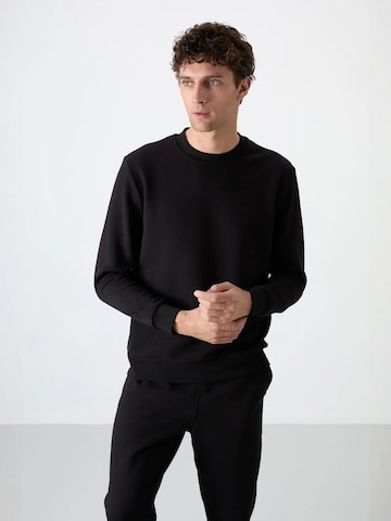 Tommy Life Joggingpak in Zwart