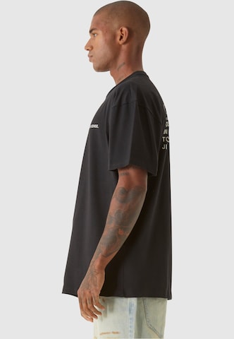 T-Shirt 'Dont't Give Up' 9N1M SENSE en noir