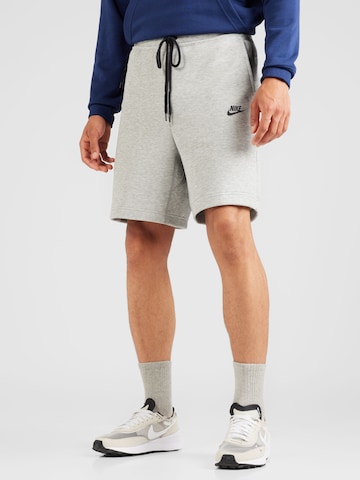 Nike Sportswear Свободный крой Штаны в Серый: спереди