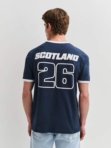 T-Shirt Next en bleu : devant