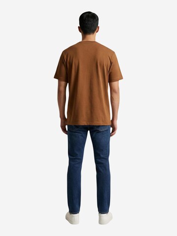 Maglietta 'ESS SEASONAL REG FIT MW0MW39995' di TOMMY HILFIGER in marrone