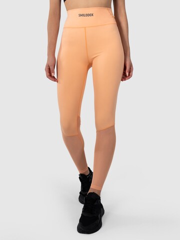 Skinny Pantalon de sport 'Karlie' Smilodox en orange : devant