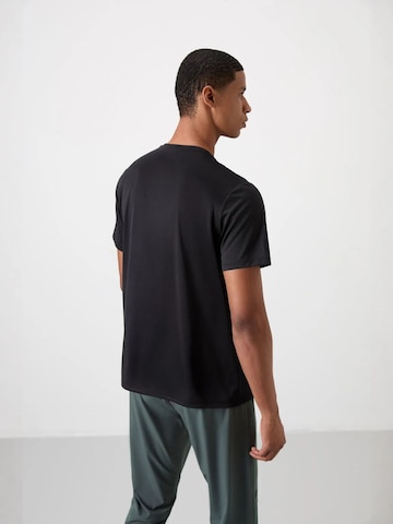 Tommy Life T-Shirts in Schwarz