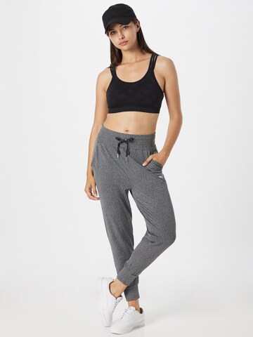 PUMA Tapered Sportbroek in Zwart