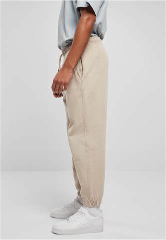 Tapered Pantaloni di Karl Kani in beige