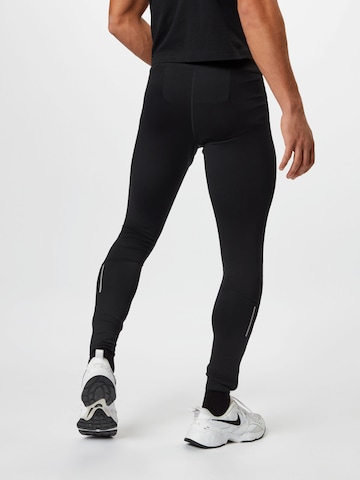 NIKE Skinny Sportnadrágok 'Challenger' - fekete