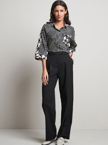 Wide leg Pantaloni cutați de la Next pe negru