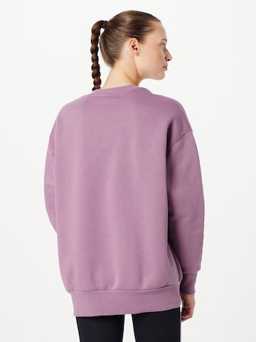purpurinė UNDER ARMOUR Sportinio tipo megztinis