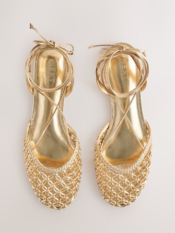 Next Ballerinasko med rem 'Forever Comfort' i guld