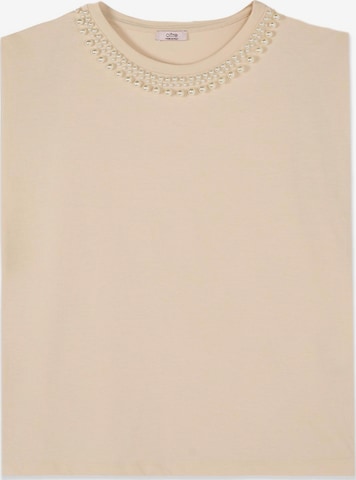 Haut oltre en beige : devant