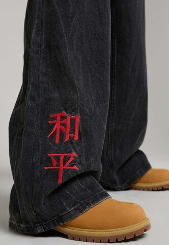 Ed Hardy Baggy Jeans 'Tattoo City Tiger' in Zwart