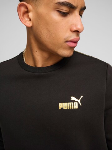 PUMA Sportsweatshirt 'ESS' in Schwarz