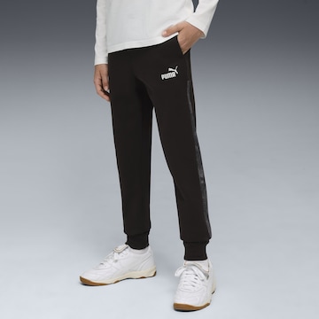 PUMA Tapered Trousers 'Essentials' in Black: front