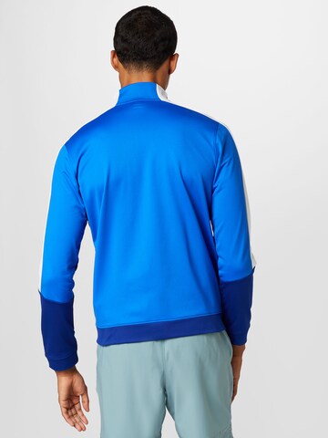 UNDER ARMOUR - Sudadera con cremallera deportiva en azul