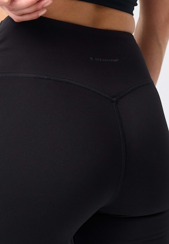 OCEANSAPART - Acampanado Leggings 'Gianna' en negro