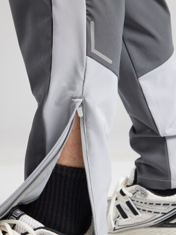 ELLESSE Дънки Tapered Leg Панталон 'Pallavo' в сиво