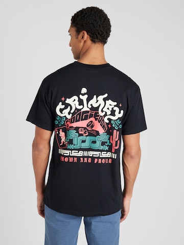 Grimey T-shirt 'CAUSING PANIC CHARLESTON' i svart: framsida