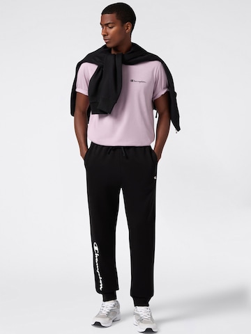 Champion Authentic Athletic Apparel Zwężany krój Spodnie w kolorze czarny