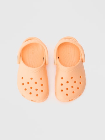 Calzatura aperta 'Classic' di Crocs in arancione