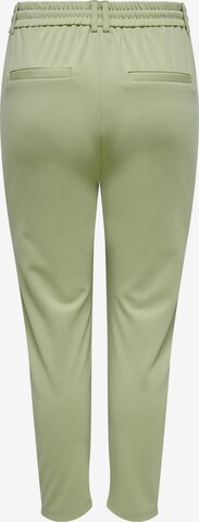 ONLY Carmakoma Regular Trousers 'GOLDTRASH' in Green