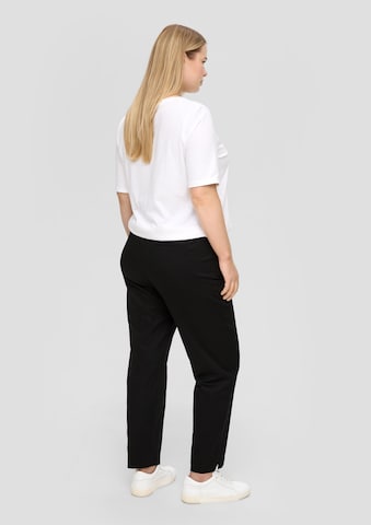 Tapered Pantaloni di s.Oliver in nero