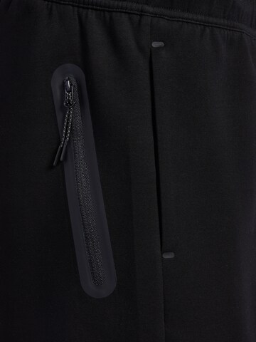 Regular Pantalon 'Tech Fleece' Hummel en noir