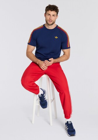 ADIDAS ORIGINALS Tapered Pants 'Firebird' in Red