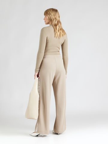 EA7 Emporio Armani Zvonové kalhoty Kalhoty – šedá