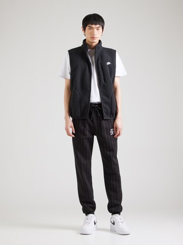 Nike Sportswear Tapered Trousers 'CLUB' in Black