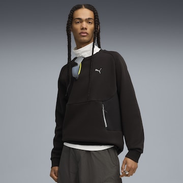 PUMA Sports sweatshirt in Black: front