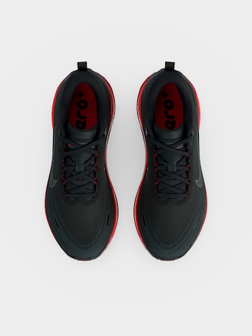 NIKE Bežecká obuv 'Vomero Plus' - Sivá