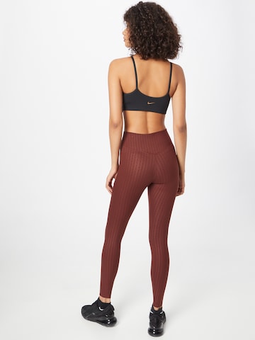 NIKE Skinny Sportovní kalhoty 'ONE LUXE' – bronzová