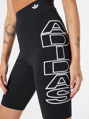 Skinny Leggings di ADIDAS ORIGINALS in nero