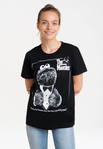 LOGOSHIRT Shirt 'Sesamstrasse – Krümelmonster Pate' in Zwart: voorkant