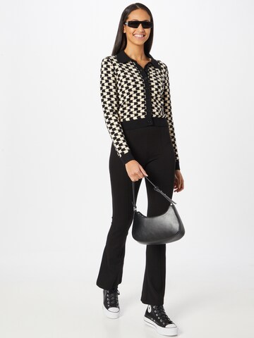 Trendyol Flared Pants in Black