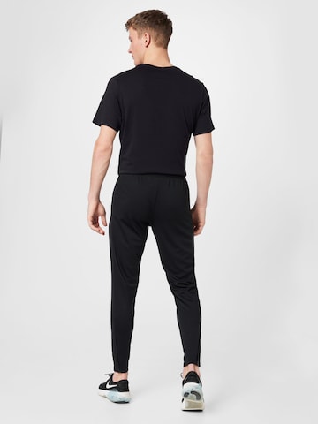 NIKE Slimfit Sportsbukser 'Academy 23' i sort