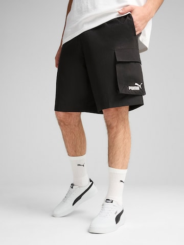 Regular Pantalon de sport 'Essentials' PUMA en noir : devant