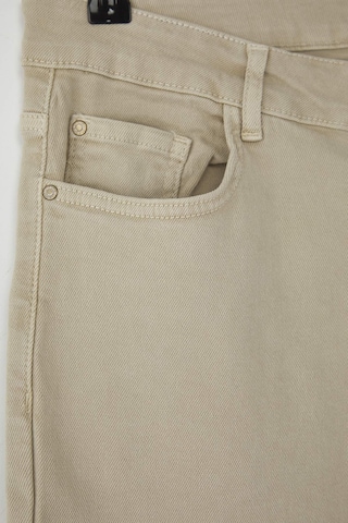 Trendyol Curve Boot cut Jeans in Beige
